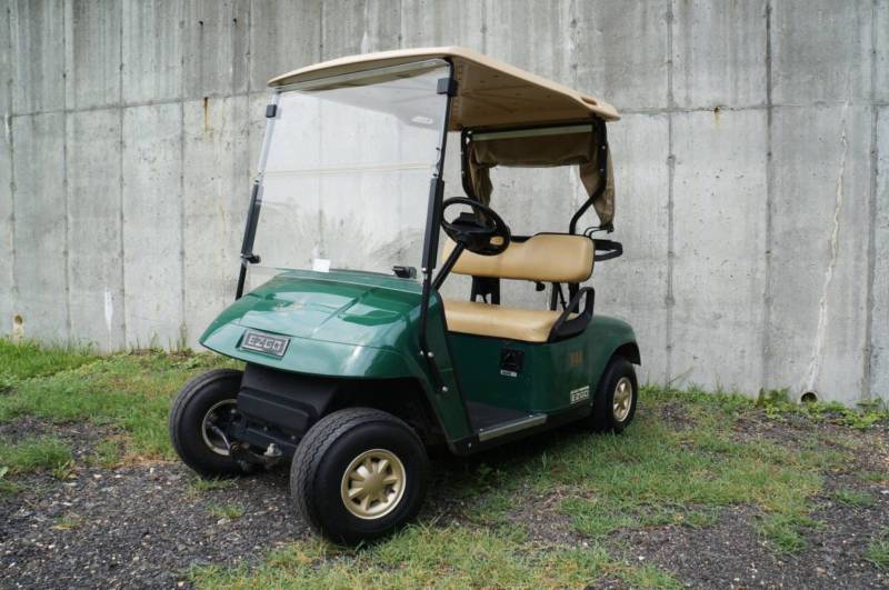 EZGo Green Body With Tan Seats 48 Volt Electric Txt 2 Passenger Golf Cart for sale from United