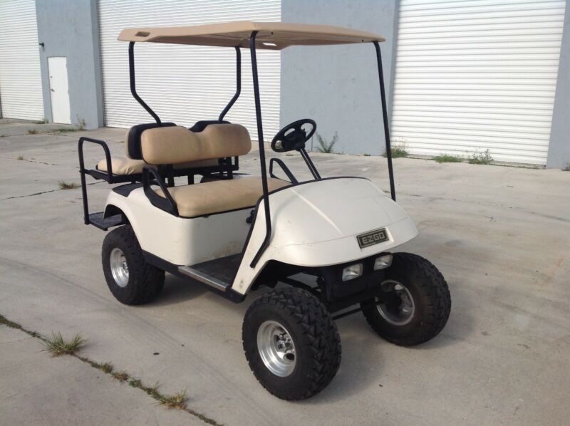 White Ezgo V Txt Passenger Golf Cart Alloys Lifted Flip Seat